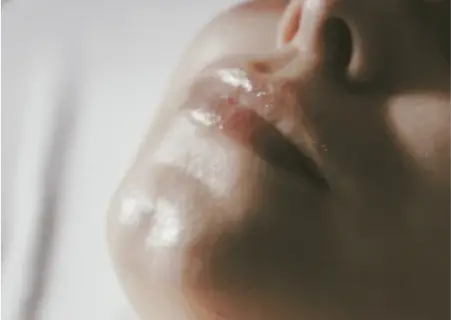 A face in soft profile light